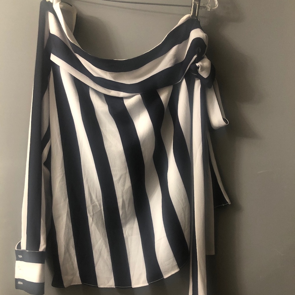 Off the shoulder one sleeve blouse